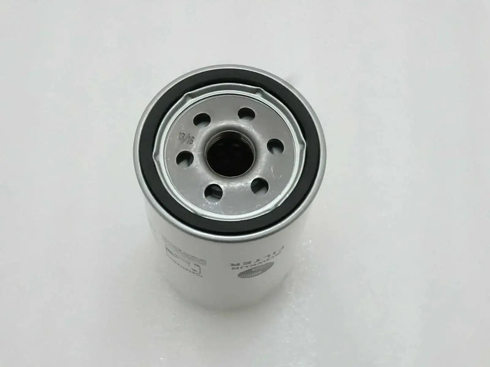 Hydraulic filter cartridge with metal end cap and center black seal