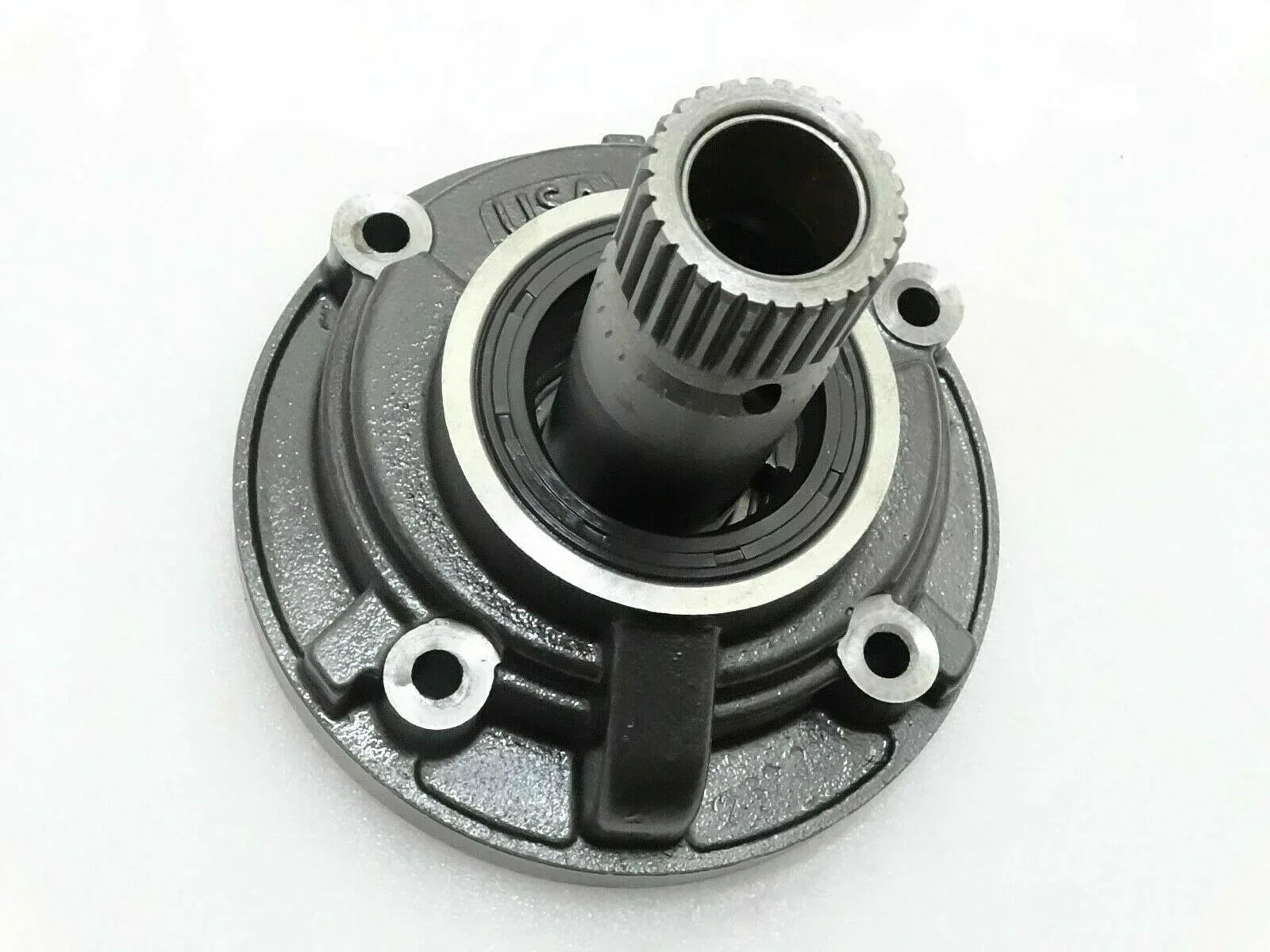 Hydraulic pump transmission, gray metal housing with central black splined inlet