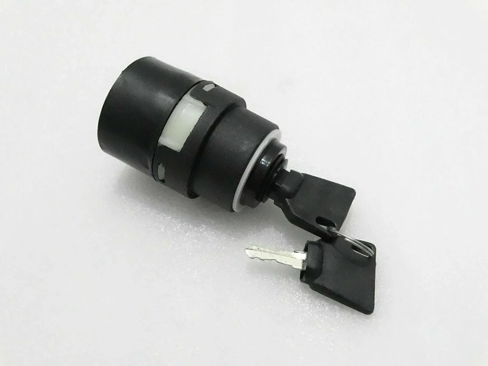 Ignition switch with two keys, black housing and silver cylinder