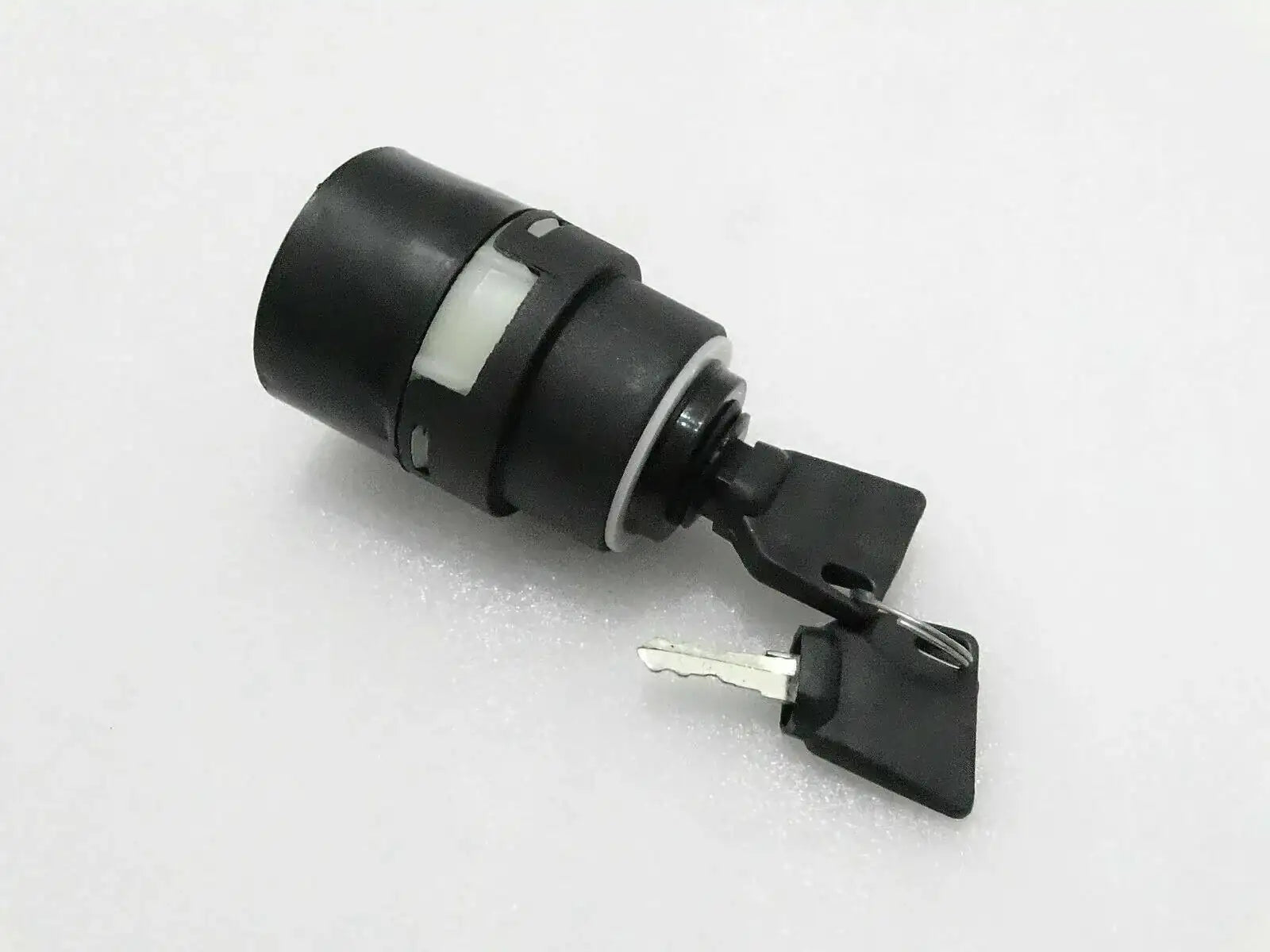 Ignition switch with two keys, black housing and silver cylinder