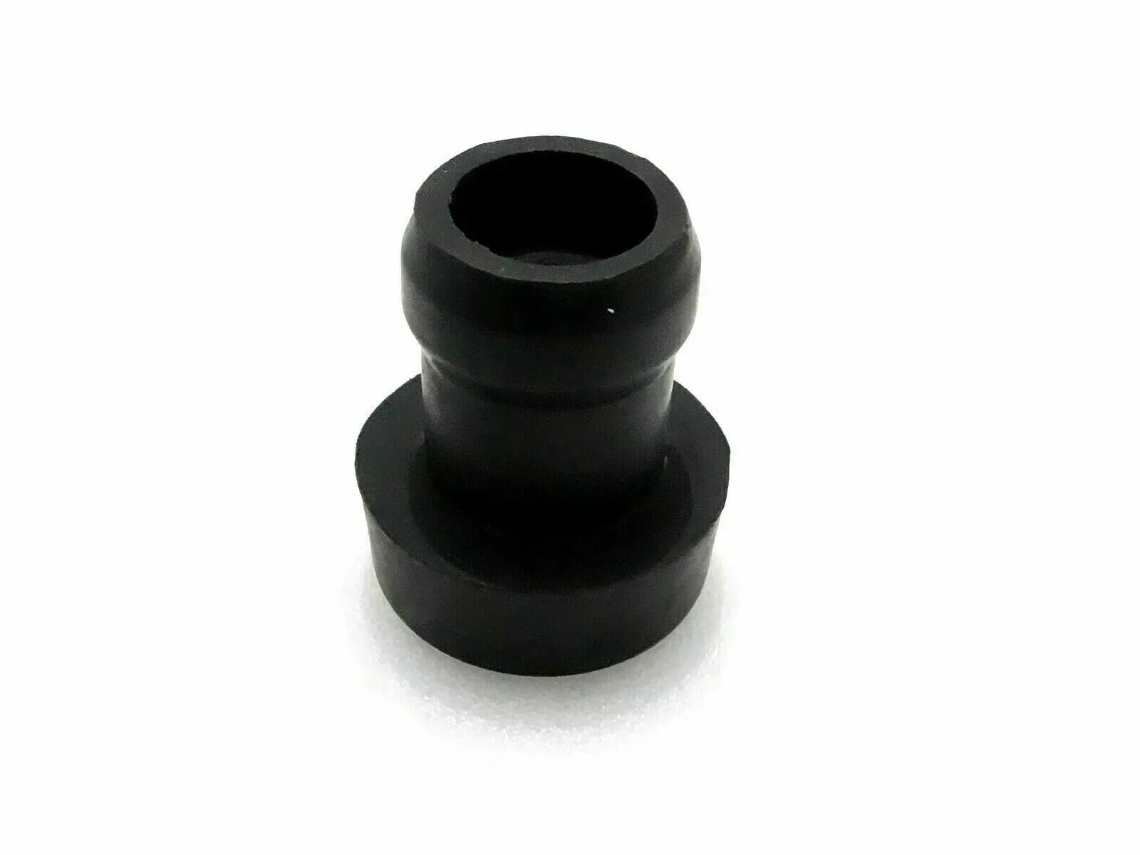 Black rubber cab mounting bushing with stepped cylindrical shape