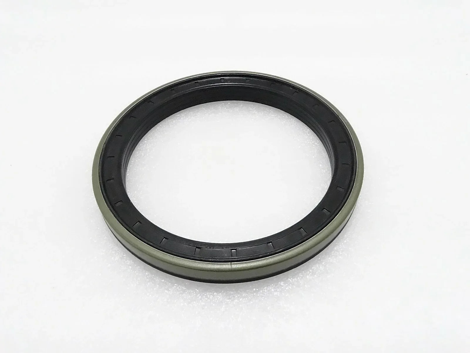 Rubber oil seal ring with black outer lip, circular profile