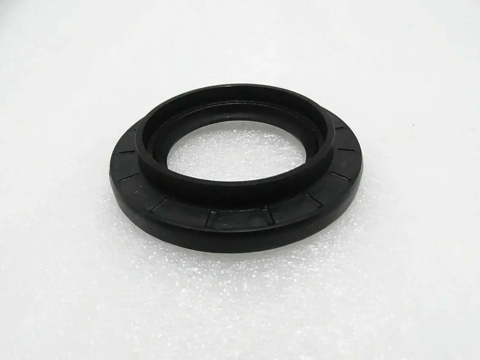 Black rubber oil seal ring with metal-reinforced lip