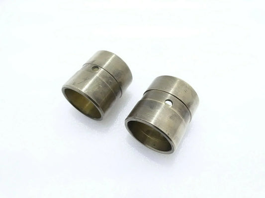 Pair of metal boom kingpost bushings, cylindrical with flange and central holes