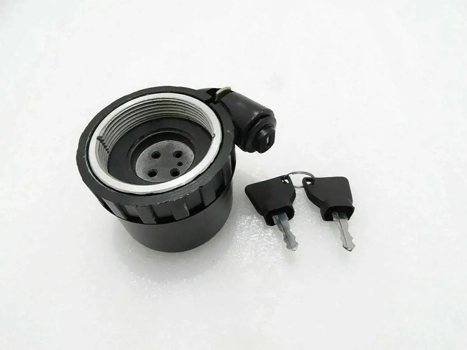Lockable hydraulic filler cap with two keys and threaded opening