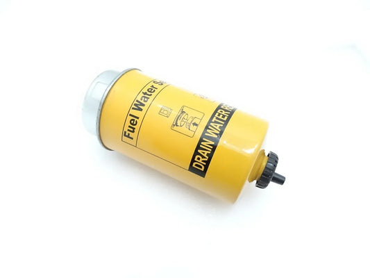 Fuel filter, yellow cylindrical canister with black fittings and Fuel Water label