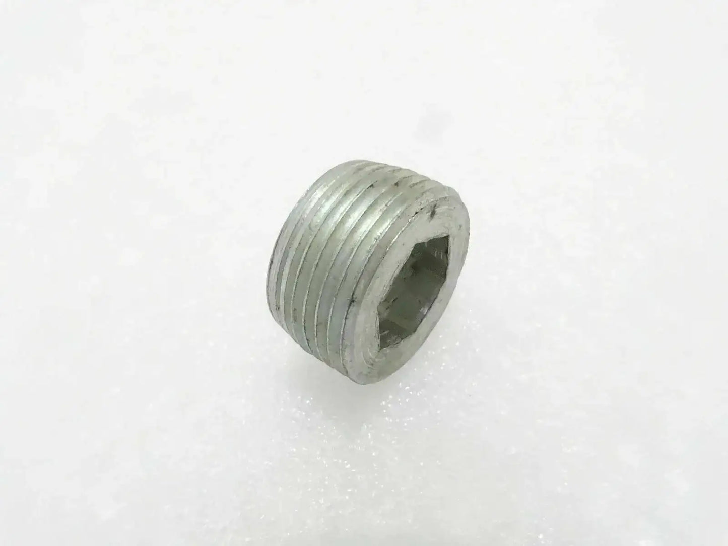 Metal threaded hub plug with internal hex drive