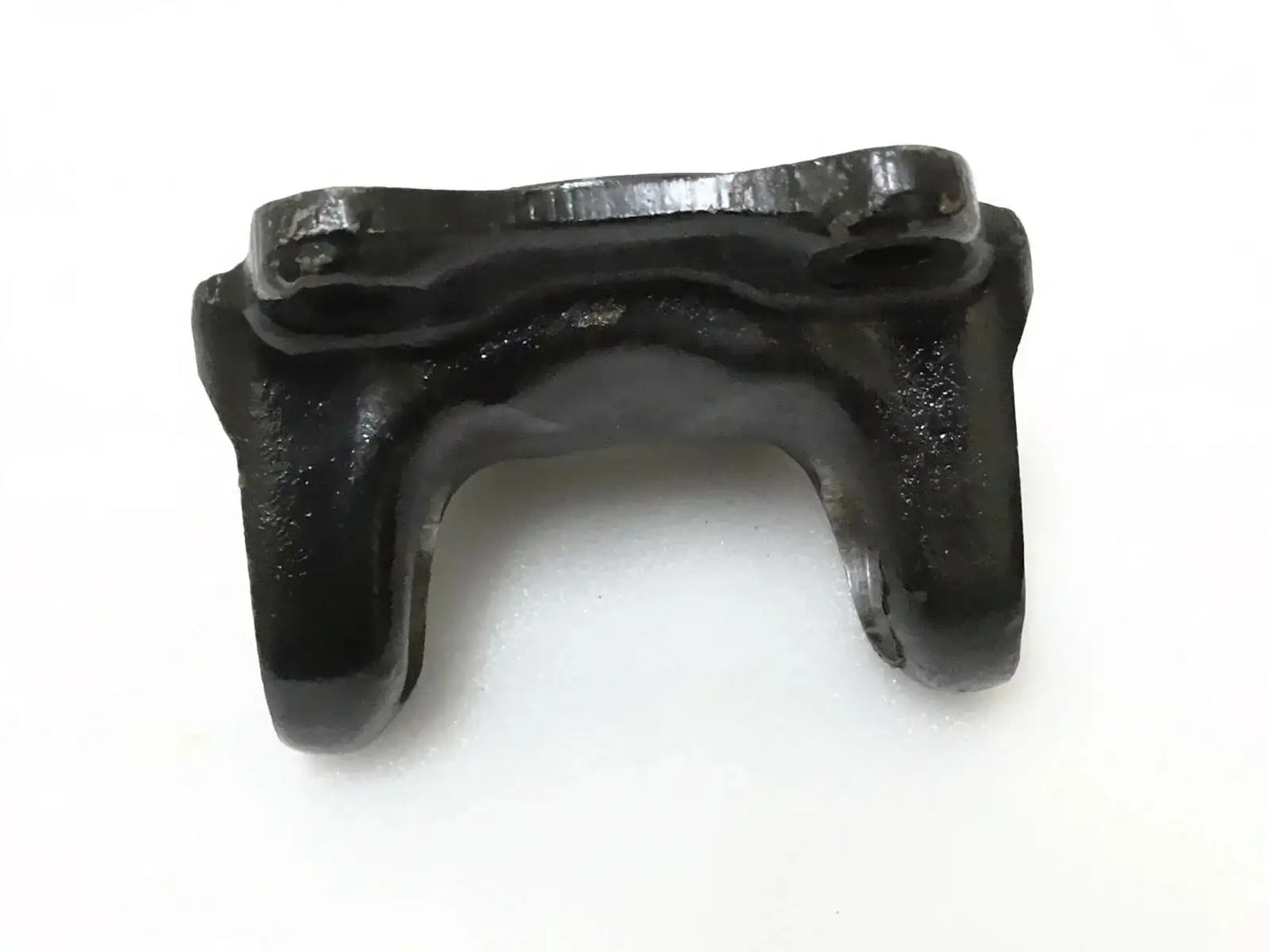 Metal flange yoke bracket with U-shaped opening and mounting tabs