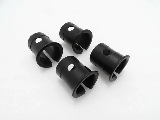 Set of four black cylindrical bushings for machine linkage