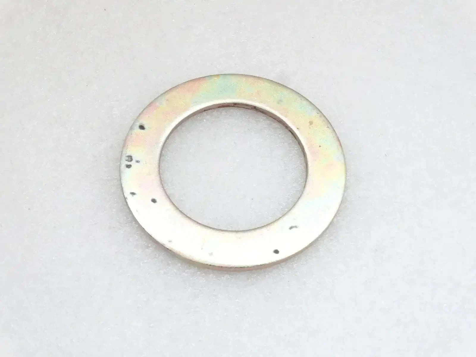 Round metal shim washer with central hole
