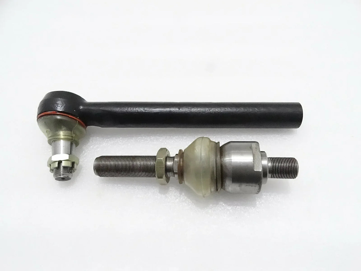 Track rod assembly with black rod and metal ball joint ends