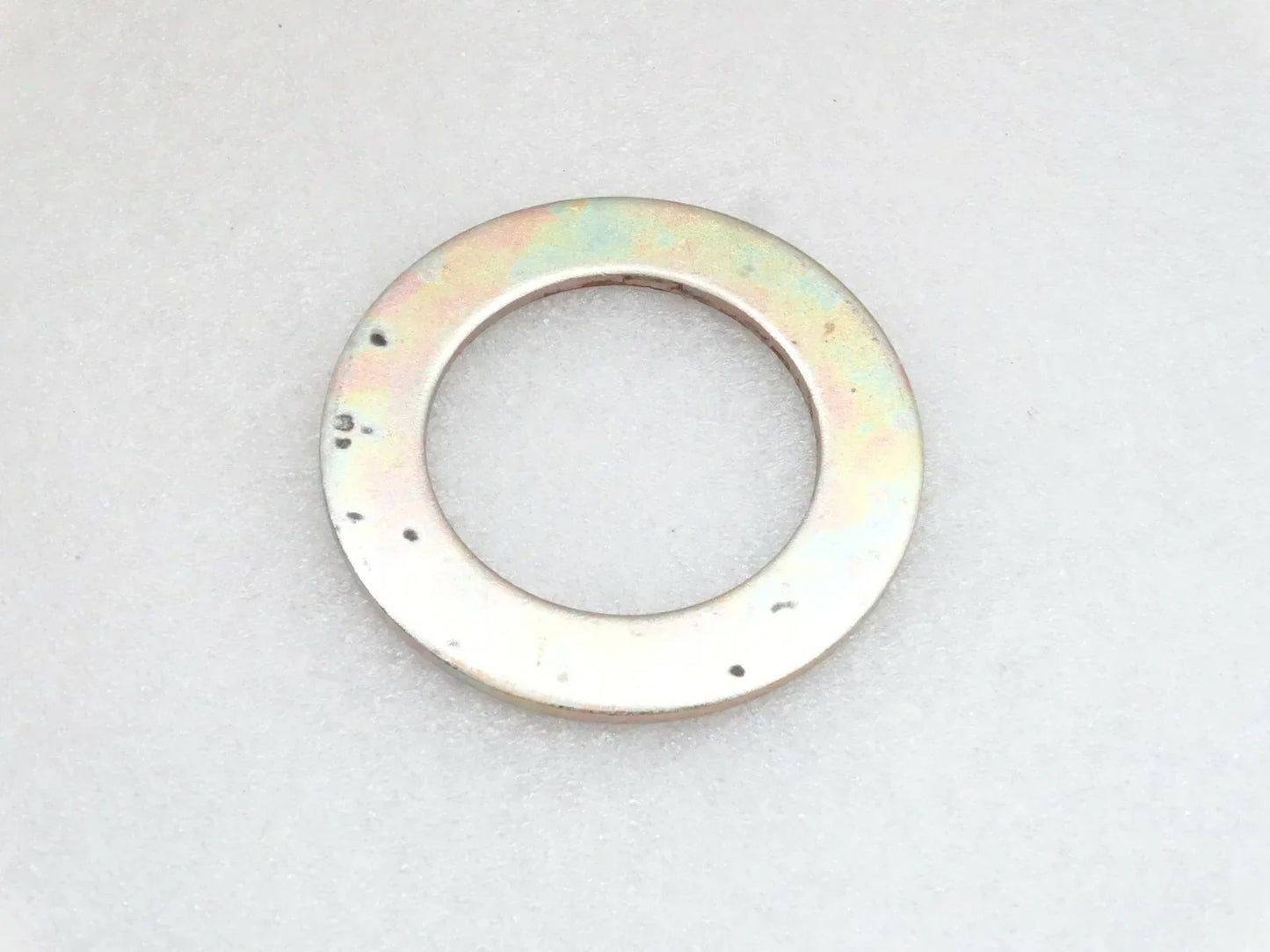 Round metal shim washer with central hole