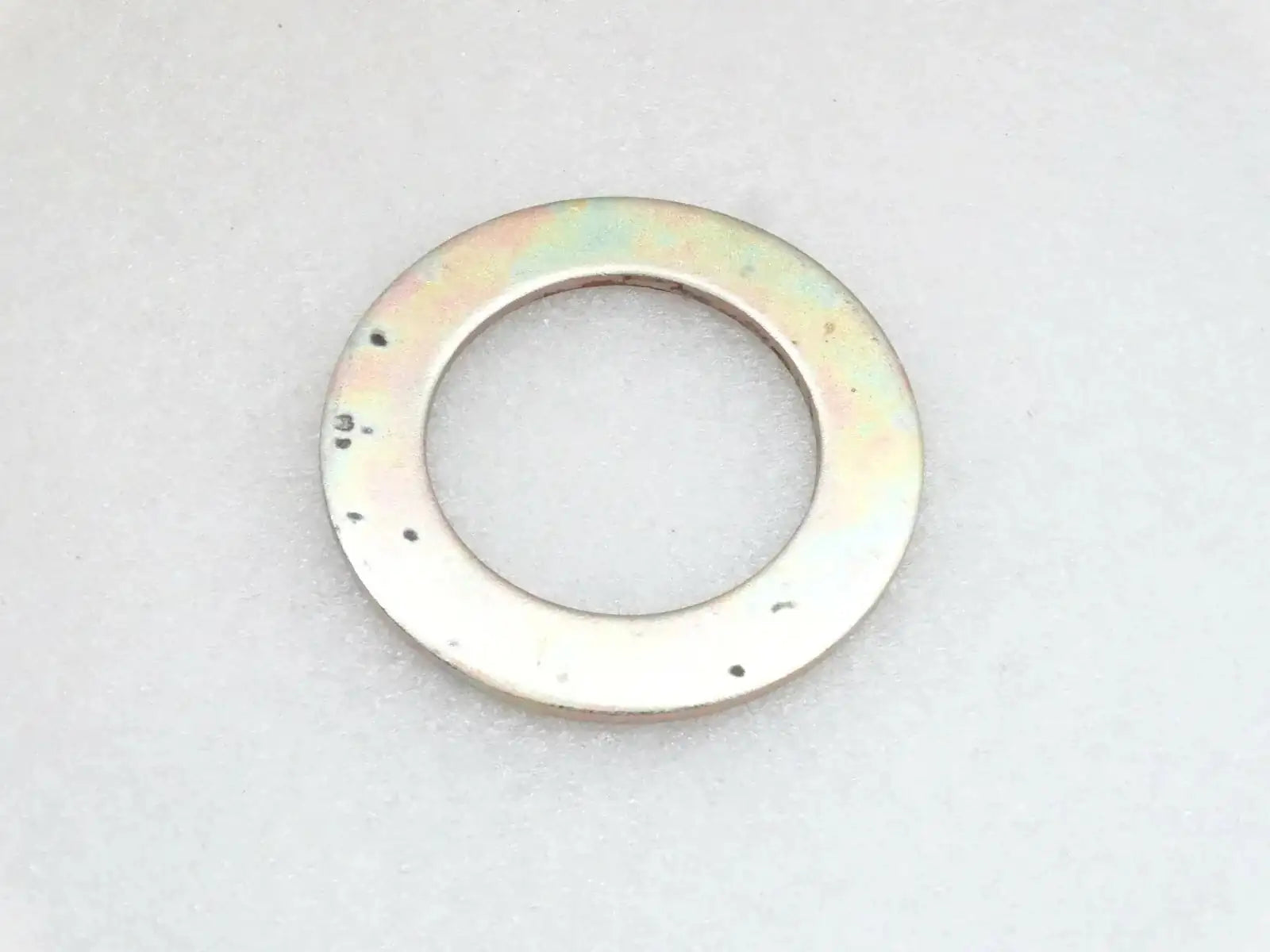 Round metal shim washer with central hole