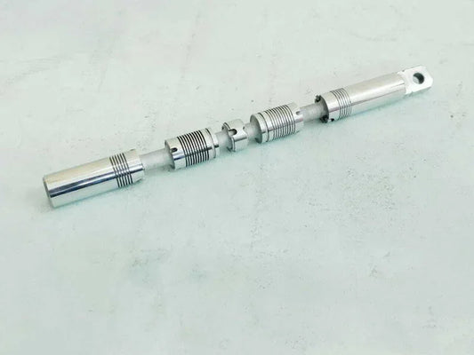 Hydraulic spool valve assembly with metal shaft and stepped spool body