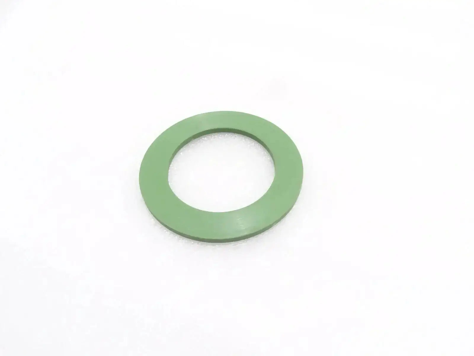 Green thrust washer with center hole for slew swing assemblies