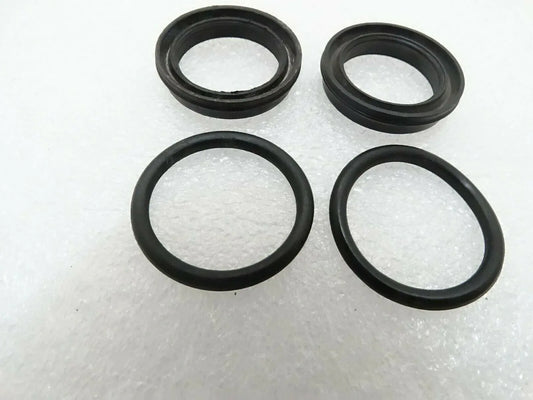 Set of four black rubber seal rings