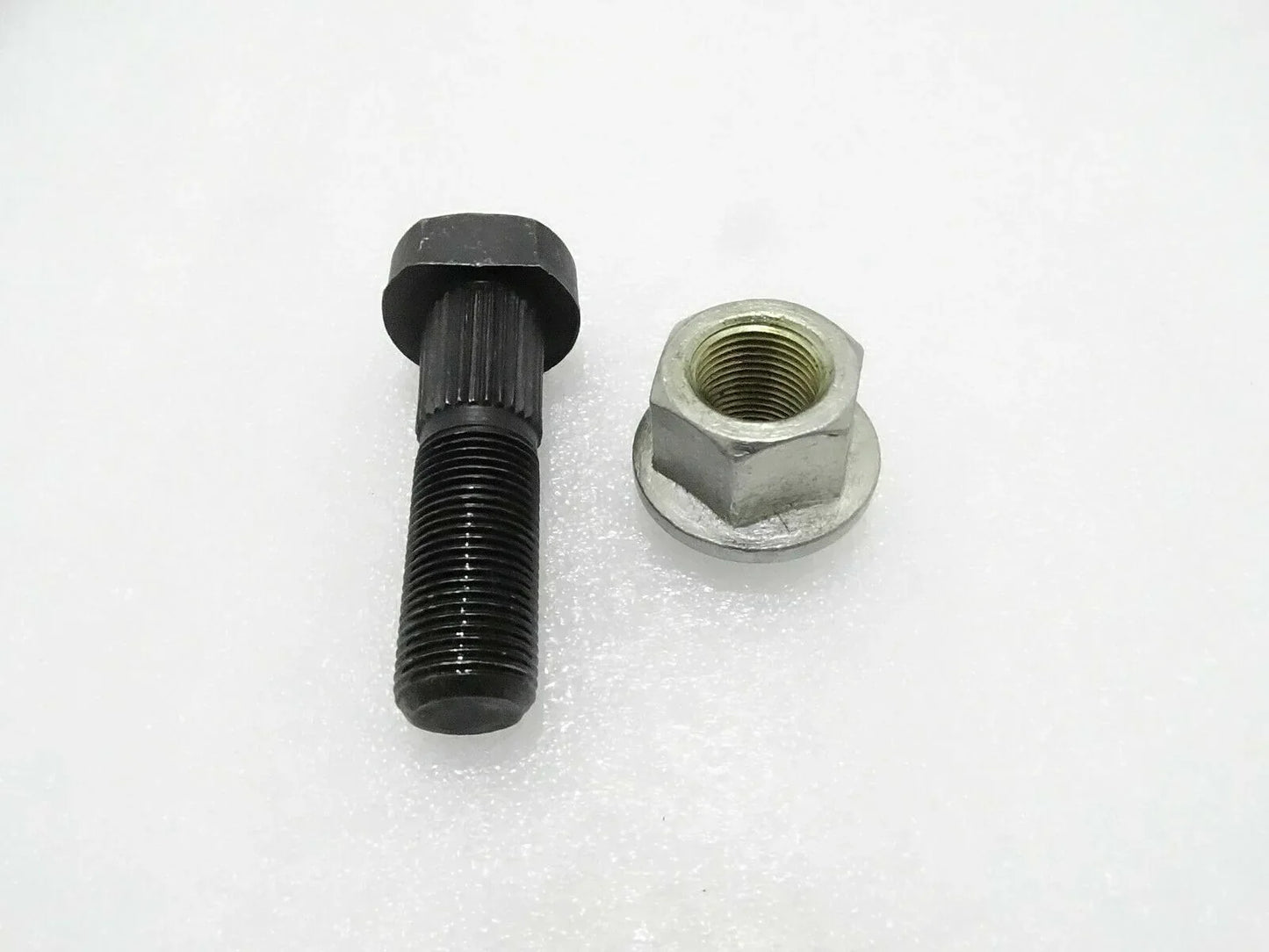 Wheel stud and wheel nut set with black threaded stud and silver hex nut
