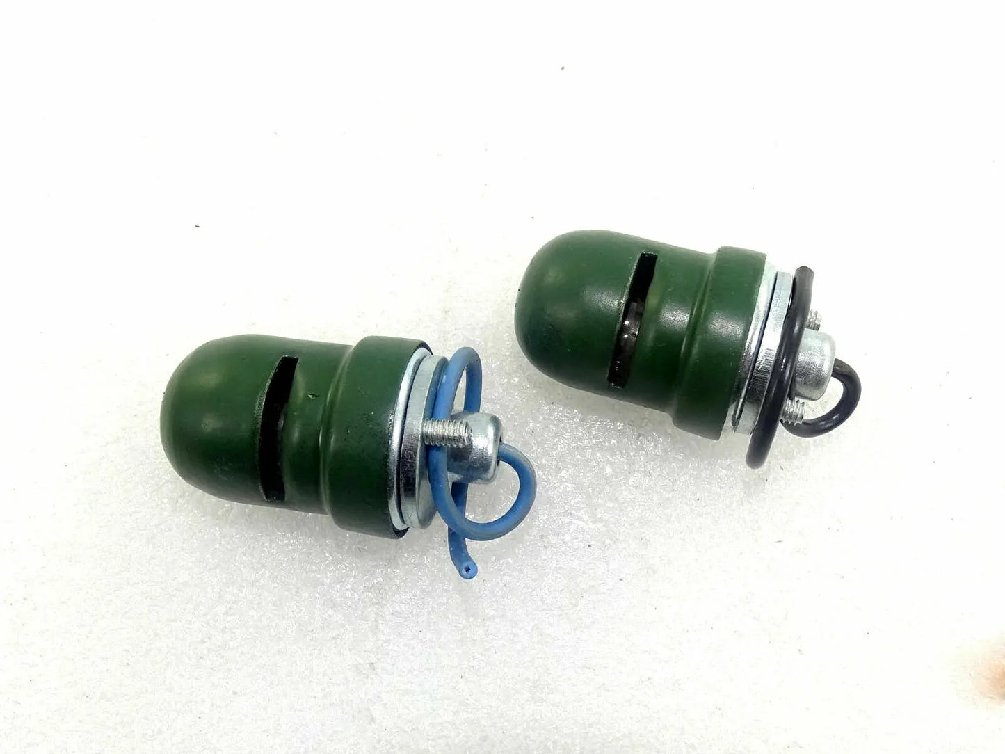 Green dashboard light mounting clips with springs and blue wire loops