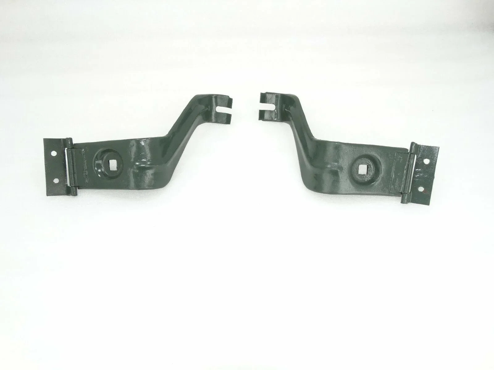 Pair of dark green metal headlight mounting brackets with mounting tabs