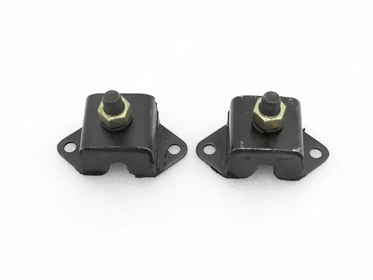 Pair of black engine mounts with mounting holes and threaded studs