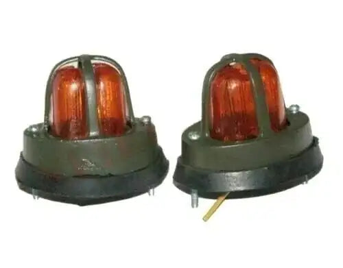 Pair of amber fender light assemblies with red lenses and dark green housings