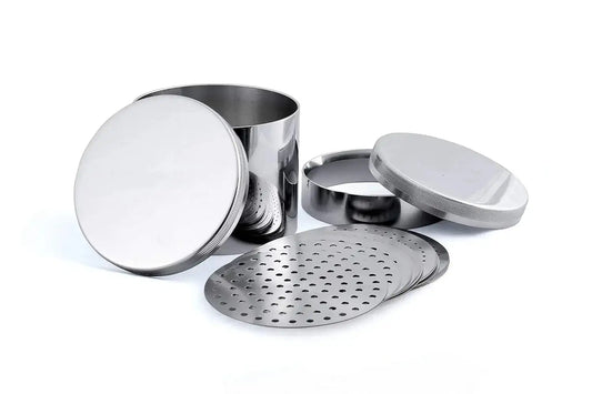 Stainless steel jewelry-making tools set including measuring cups and perforated discs for accurate bead sizing