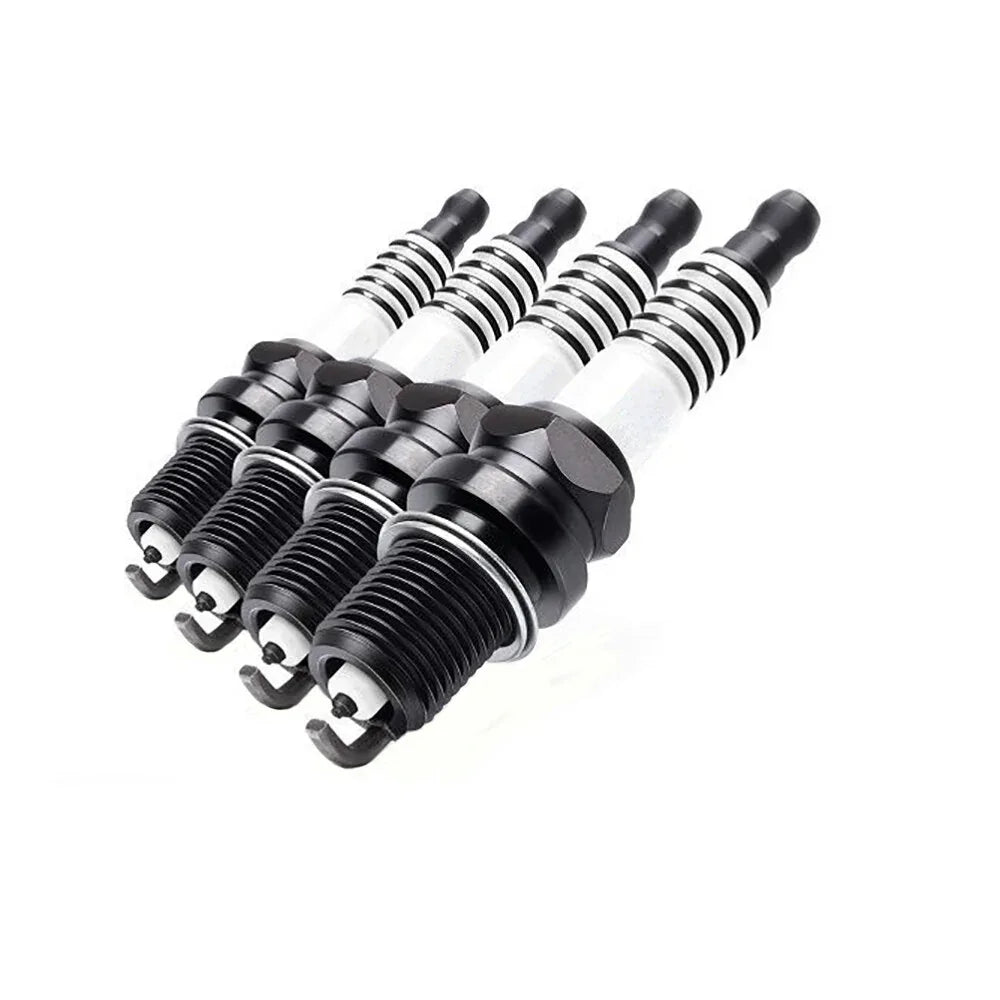 Set of four spark plugs for John Deere model tractors, durable metal construction for efficient engine performance