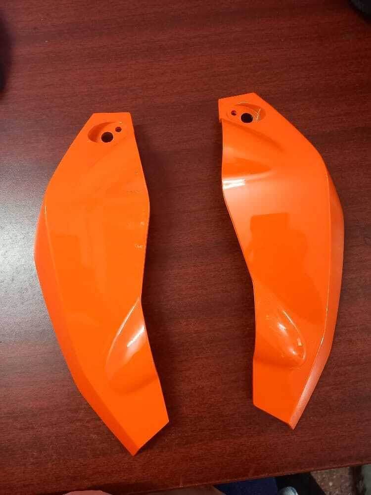 KTM Duke 200 light cover set in vibrant orange for enhanced bike visibility