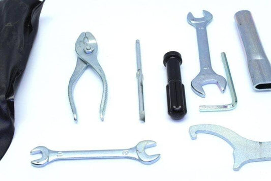 KTM Duke tool kit with various steel tools for motorcycle maintenance including wrenches and pliers