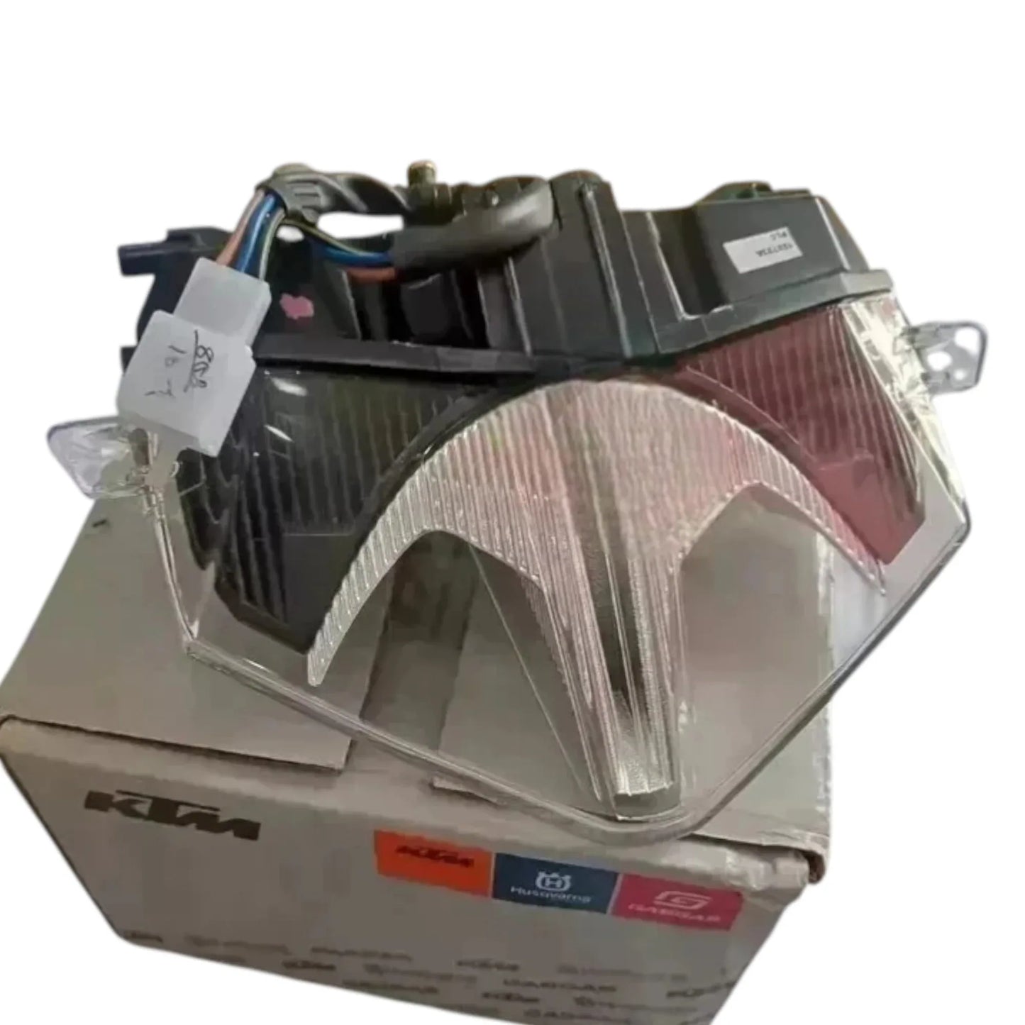 KTM motorcycle tail light, durable plastic, compact design for improved visibility and safety
