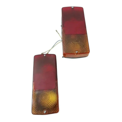 Tractor indicator flasher lights with red top lens and amber bottom lens
