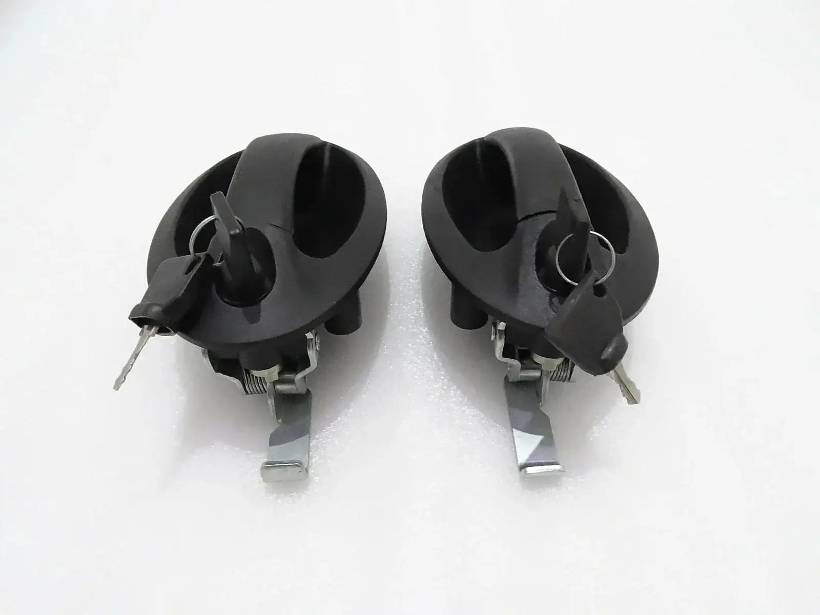 JCB 3CX 4CX lever set door handle, durable black plastic, designed for heavy machinery use