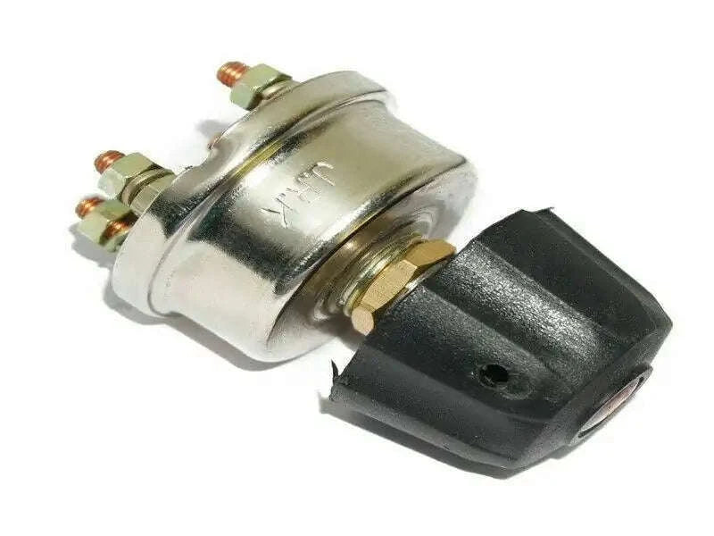 Metal light switch with black plastic connector and brass terminals