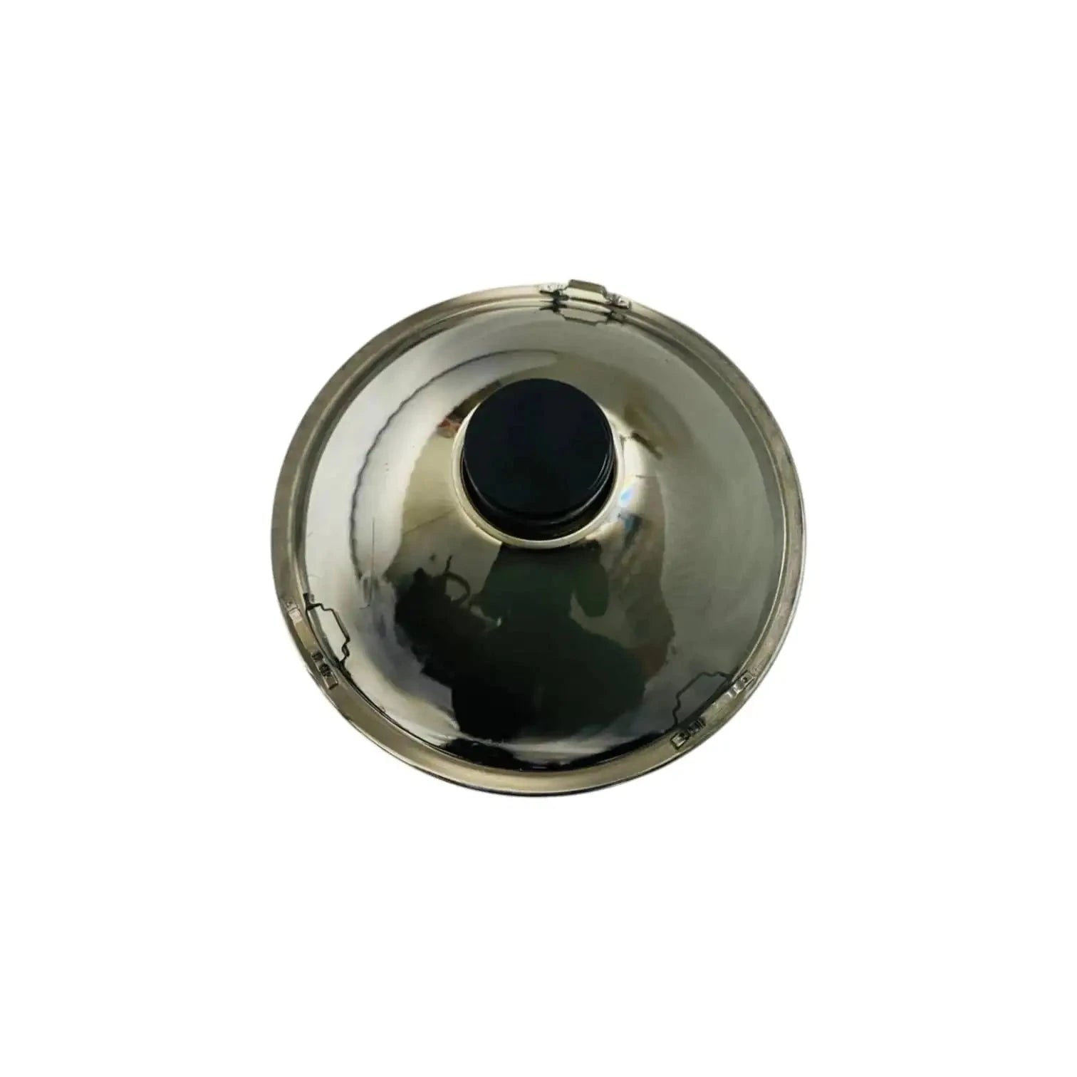 Sealed headlamp housing with chrome reflector bowl and black bulb opening