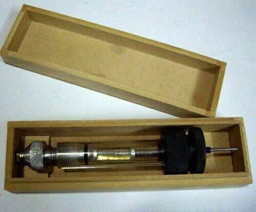 Lucas Delphi pump gauge in a wooden box for precise automotive measurements
