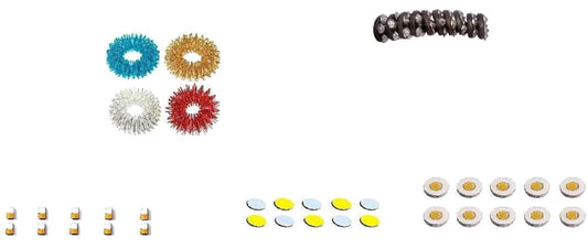 Assorted ACUPRESSURE magnet therapy treatment accessories including star, bar, and chakra magnets