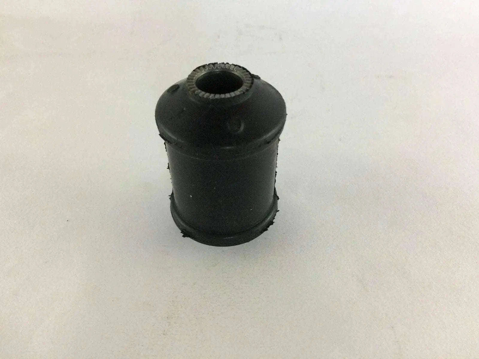 Mahindra bush lower arm front, durable rubber design for optimal stability.