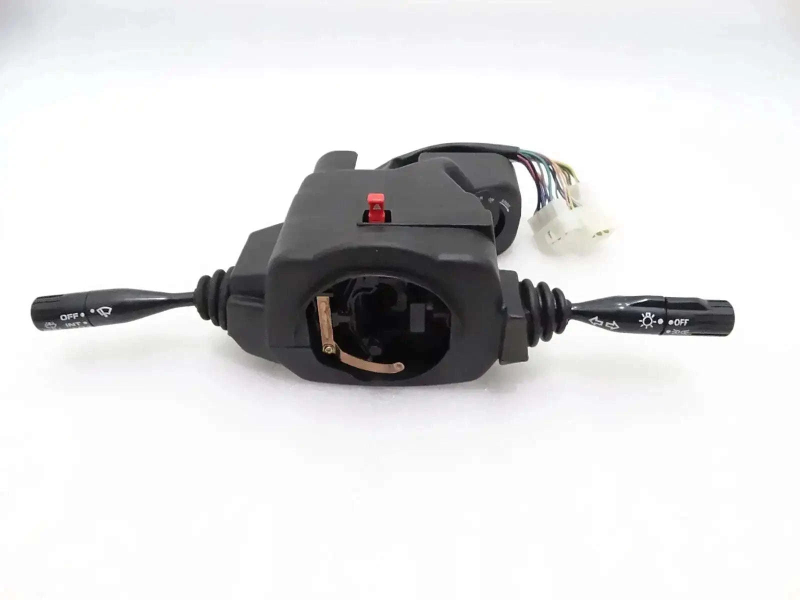 Combination switch with black lever housing, red button, and multi-wire connector