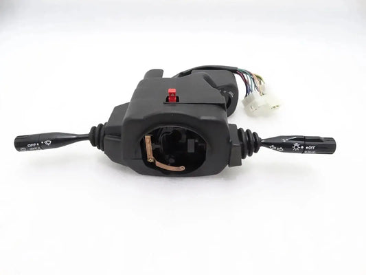 Combination switch with black lever housing, red button, and multi-wire connector