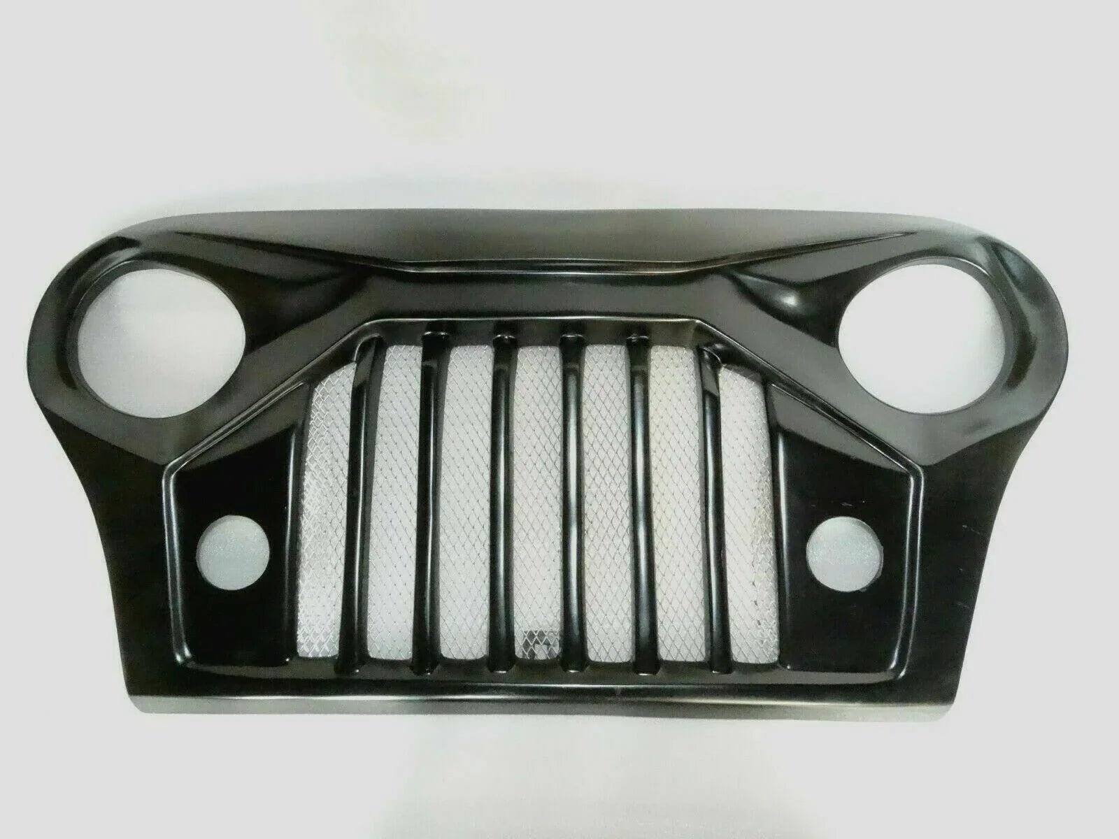 Front grill for Mahindra Thar, made of durable plastic, designed for improved airflow and style