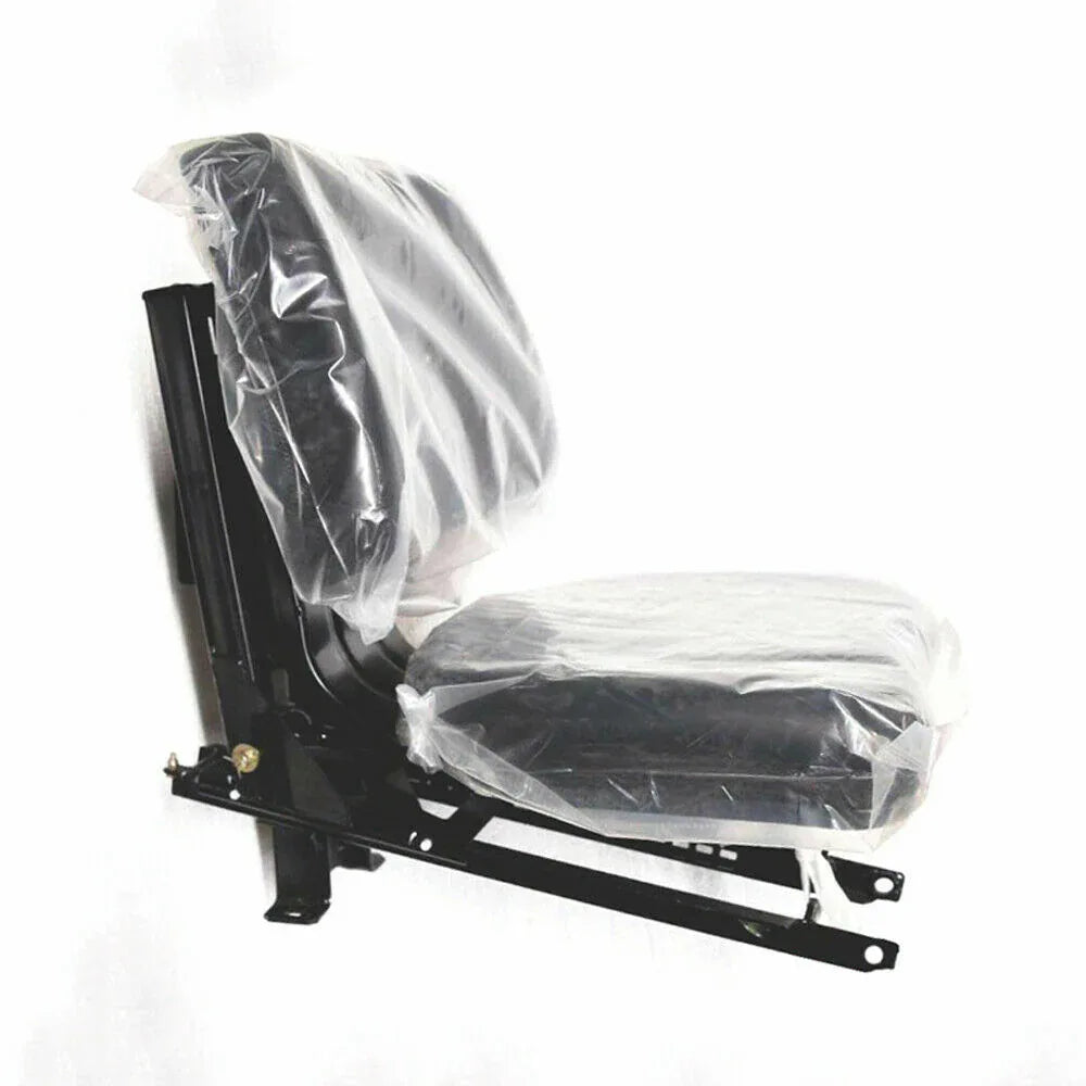 Tractor seat assembly with black metal frame and padded cushion, wrapped for protection