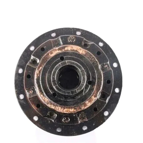 Tractor differential case, round black metal flange with bolt holes and center shaft