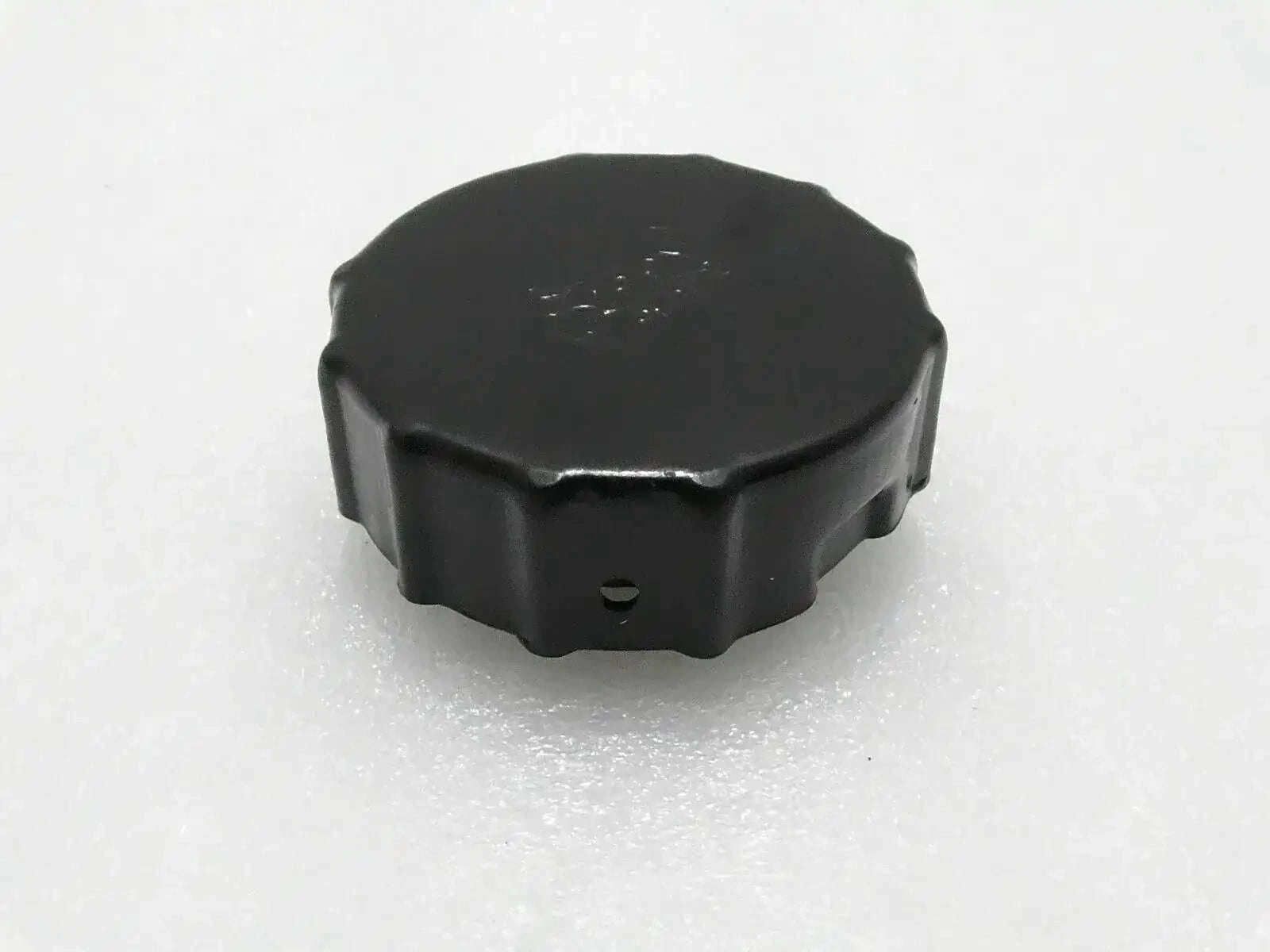 Mahindra tractor fuel tank cap, black plastic round cover with side tabs
