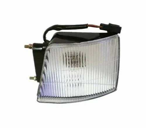 Left-hand front parking lamp for Mahindra tractor, durable plastic, essential for safety and visibility.