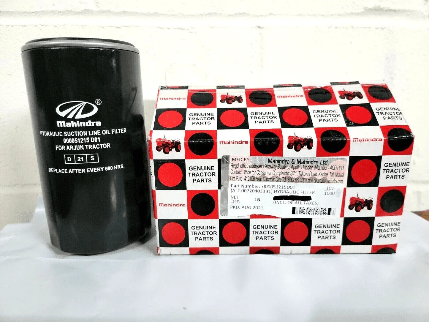 Mahindra tractor hydraulic filter, black metal construction, vital for maintaining optimal fluid flow in tractors