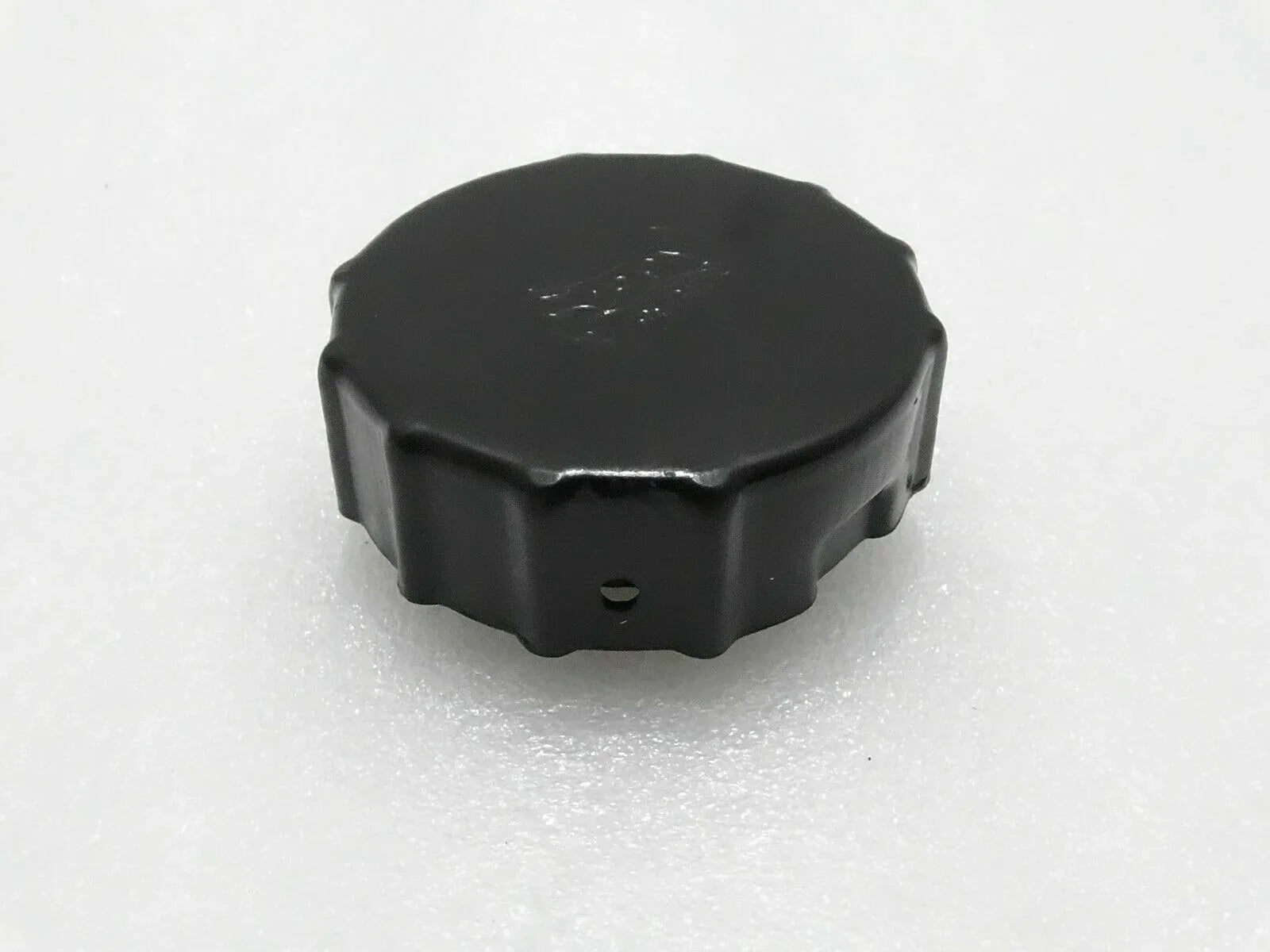 Mahindra tractor fuel tank cap, black plastic round cover with side tabs