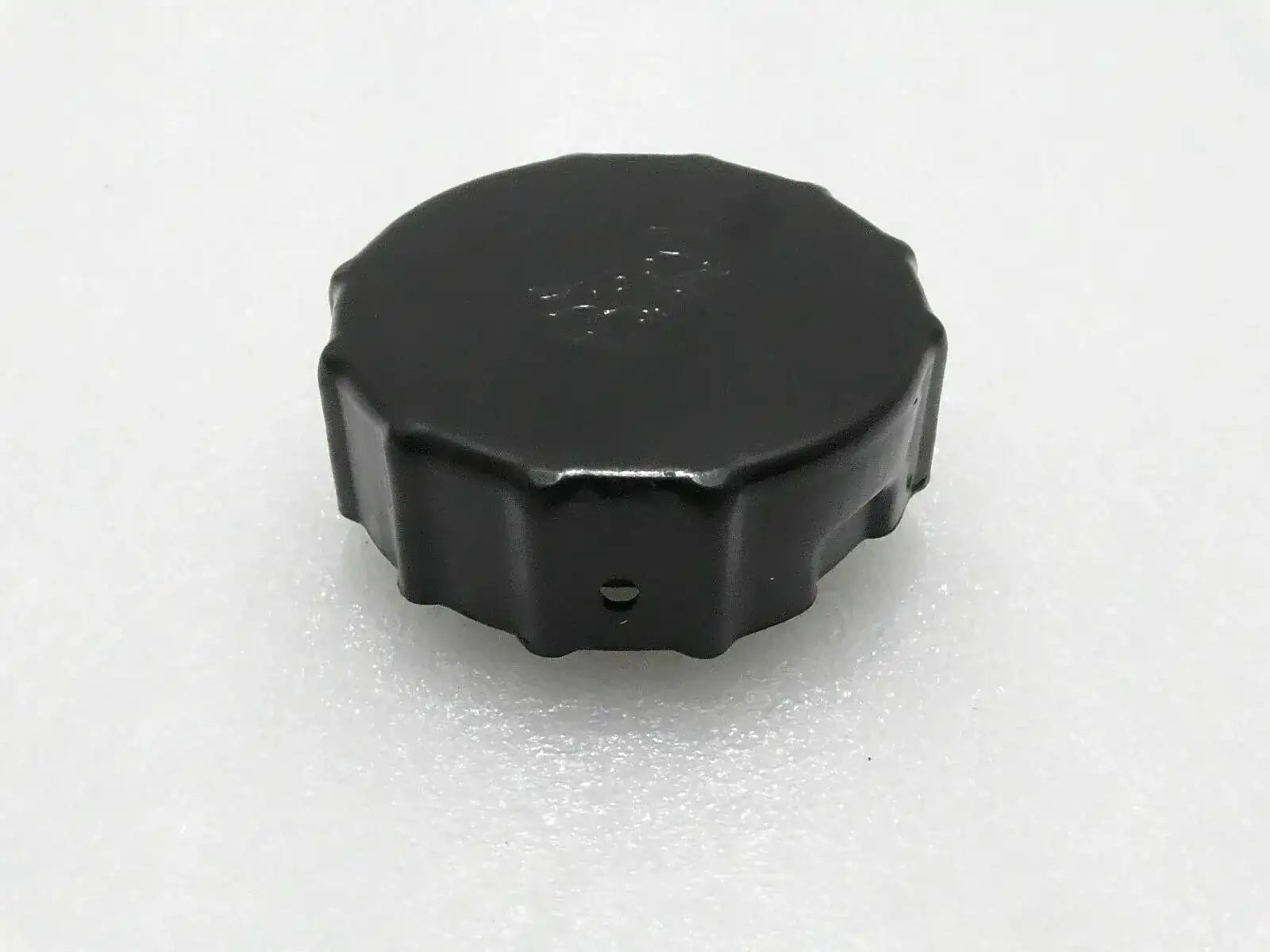 Mahindra tractor fuel tank cap, black plastic round cover with side tabs
