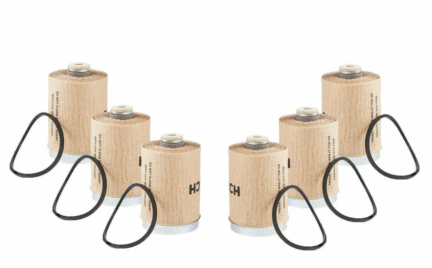 Tractor filter set with cylindrical paper filters and black rubber seals