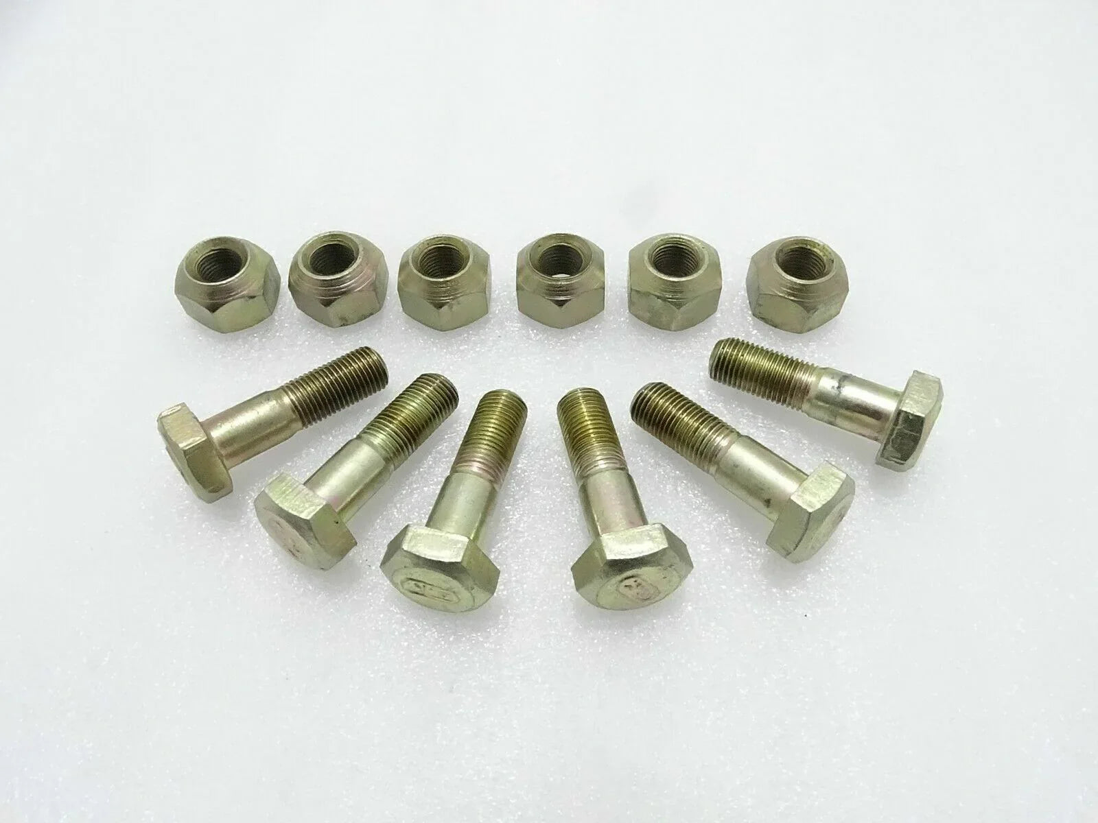 Front wheel hub bolts and nuts set for tractors Mahindra, made of durable steel, ideal for secure wheel assembly