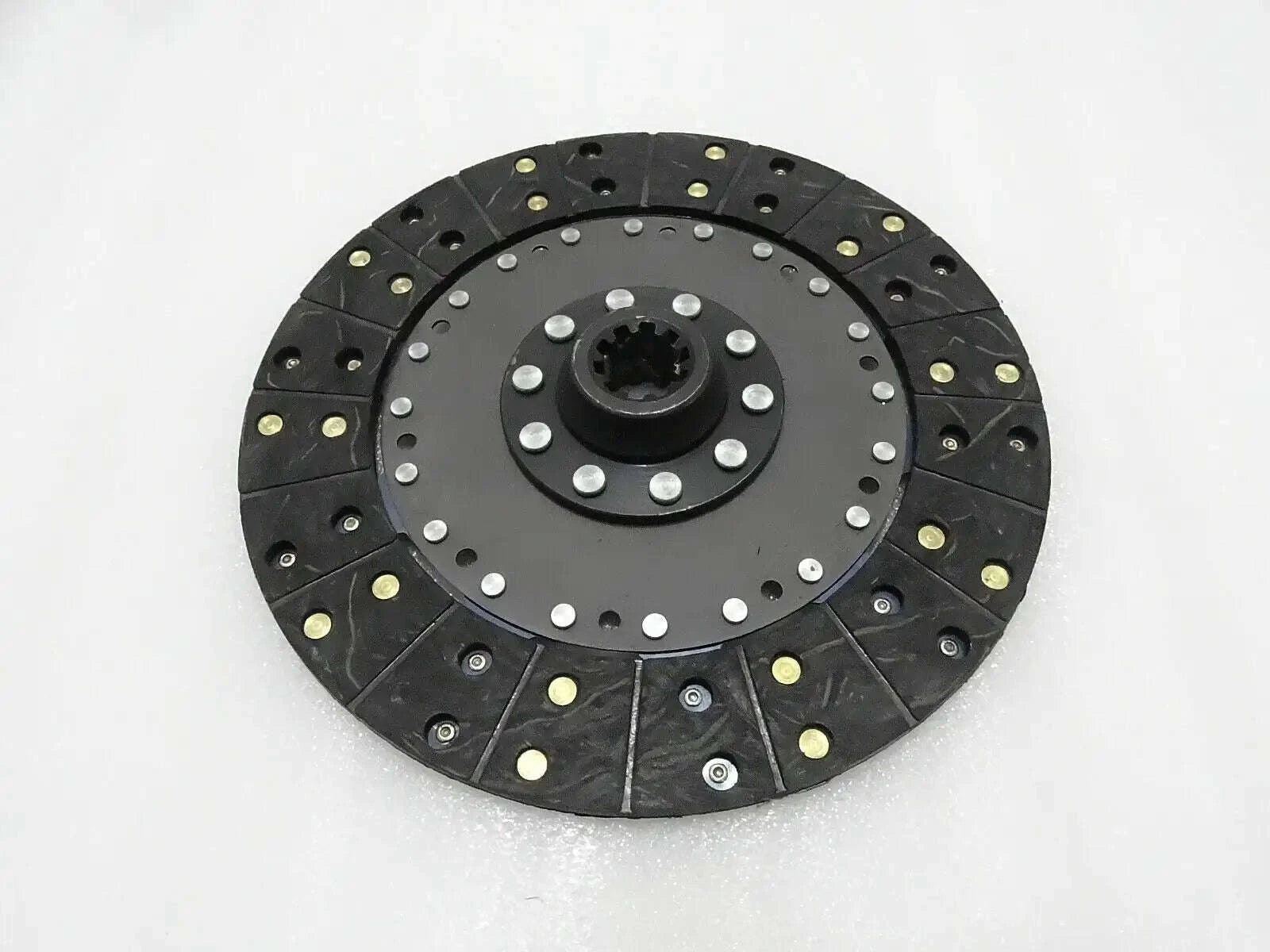 Massey Ferguson black clutch plate with 10-spline center and riveted pressure segments